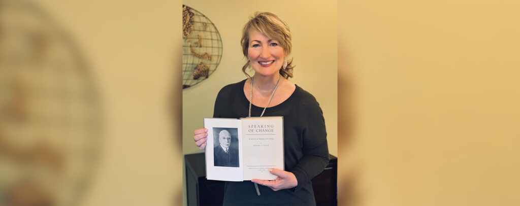 Rhonda Sheets holding Edward Filene book