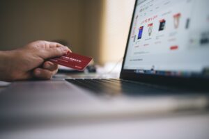 Man making purchase with credit card online