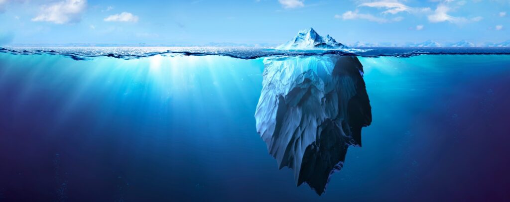 iceberg shows danger lurking beneath surface of water