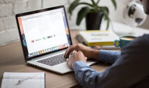 Customer looking at email on laptop